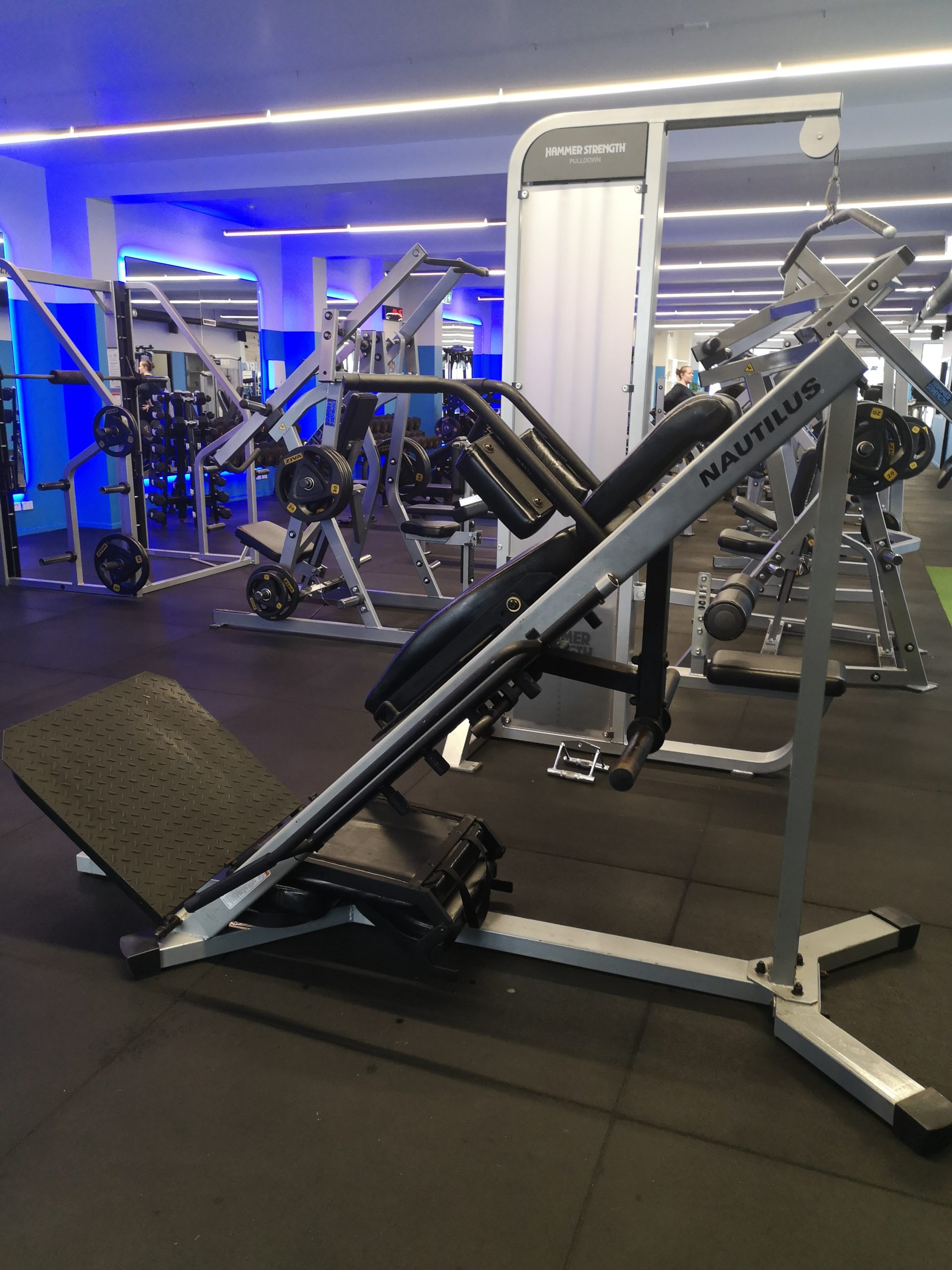 gym with hack squat machine